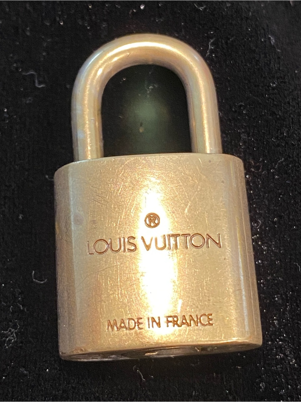 Louis Vuitton Gold Padlock Accent